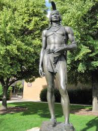 The Native-American statue clearly lacks clothes, thereby breaking most honor code restrictions.