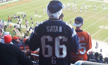 Satan even customized his own jersey to wear when supporting the Patriots.