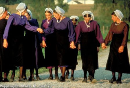 A group of Amish girls walk to their civil engineering classes.